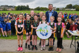 NMDDC Deputy Chairperson, Councillor Gareth Sharvin with pupils from St Patrick&rsquo;s, PS, Crossmaglen who won second place in the girls&rsquo; team race. - Be Active School's Cross Country Challenge 2023