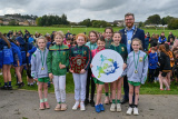 NMDDC Deputy Chairperson, Councillor Gareth Sharvin with pupils from Carrick PS, Burren who won the Best School plaque in the girls&rsquo; race and gold medals for their team race. - Be Active School's Cross Country Challenge 2023