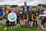 NMDDC Deputy Chairperson, Councillor Gareth Sharvin awarded pupils from St Patrick&rsquo;s Crossmaglen with medals for winning first place in the boys&rsquo; team race and with a special plaque for Best School in the boys&rsquo; race. - Be Active School's Cross Country Challenge 2023