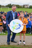 NMDDC Deputy Chairperson, Councillor Gareth Sharvin with Conor McGeough from Grange PS, Kilkeel who won second place in the boys&rsquo; race. - Be Active School's Cross Country Challenge 2023