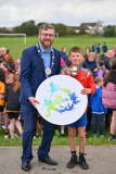 NMDDC Deputy Chairperson, Councillor Gareth Sharvin with Donnchadh Bohill from St Patricks PS, Saul who won first place in the boys&rsquo; race. - Be Active School's Cross Country Challenge 2023