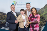 Chairperson Cllr Phlip Campbell is photographed with Cian McEvoy, the recipient of the Chairperson&rsquo;s Special Award and his mum and dad, Gerard and Lauren McEvoy. - Chairperson&rsquo;s Civic Awards 2026 