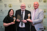 The Special Recognition Award for achievements in handball was won by the Doyle family, James and M&aacute;ighr&eacute;ad and F&iacute;achra &Oacute; D&uacute;ill, who this year won County Handballer of the year and all Ireland senior wallball title adding to his previous titles. The award was presented by Chairman Kieran Shields to grandparents Sean and Una Reavey. Photograph: Columba O'Hare/ Newry.ie  - St Killian's GAC Annual Dinner 2026