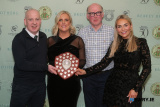Senior Ladies captain Anna Ferris received the Division 4 League Shield from management team Raymie O'Rourke, John Collins and Julie Murphy at the St Killian&rsquo;s GAC Annual Dinner Dance in the Canal Court, Newry. Photograph: Columba O'Hare/ Newry.ie - St Killian's GAC Annual Dinner 2026