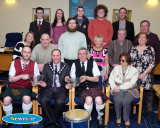 Ronan and Martin Fitzpatrick receive awards for their wins in the World Pipe Band Championships from Mickey Ruane, Chairperson, Newry, Mourne and Down District Council while looking on are family members. Photograph: Columba O'Hare - Martin and Ronan Fitzpatrick and Orlaith Hollywood council presentation