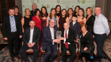 Jarlath Burns, President of GAA presents John Moley with the Pat O'Hanlon Hall of Fame Award. John and his wife Louise are pictured along with the extended Moley family. Photograph: Columba O'Hare/ Newry.ie - St Killian's GAC Annual Dinner 2026