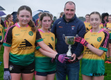Michael McKenna, Armagh LGFA presents the cup to Shamrock Gaels who beat Shane O'Neills in the Armagh LGFA U14 Division 4 Championship Final at Crossmaglen.   - Armagh LGFA Final's Lissummon V Keady and Shamrock Gaels V Shane O'Neills