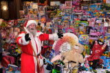 Santa Claus in front of the amazing toy mountain at the Newry Business Christmas Charity Dinner in the Canal Court Hotel. Photograph: Columba O'Hare/ Newry.ie - 2023 - A Year in Pictures