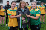 Karen Rogers, Buttercrane Office Manager presents the Armagh Ladies Junior Championship Cup to Lissummon joint managers Niamh O'Hagan, left and Zara Magill. Lissummon beat Keady in the final of the Buttercrane Armagh LGFA Junior Championship at Crossmaglen. Photograph: Columba O'Hare/ Newry.ie   - Armagh LGFA Final's Lissummon V Keady and Shamrock Gaels V Shane O'Neills