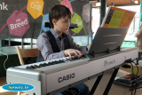 Thirteen year old Jude Kennedy from Hillsborough entertaining at Newry Food Festival. Photograph: Columba O'Hare - Newry Food Festival 2016