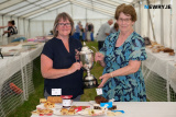Dianne Herron won the Home Baking section at Newry Show and is pictured getting her trophy from Myrna Glass at Newry Show. Photograph: Columba O'Hare/ Newry.ie - Newry Show 2023