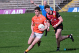 Armagh's Jarly &Oacute;g Burns under the watchful eyes of Down's Ryan McEvoy at the Ulster Football Semi Final in Clones. Photograph: Columba O'Hare/ Newry.ie - Armagh v Down in Ulster Championship Semi Final 2024