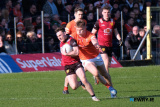 Down's Ceilum Doherty tries to escape from Armagh's Rian O'Neill at the Ulster Football Semi Final in Clones. Photograph: Columba O'Hare/ Newry.ie  - Armagh v Down in Ulster Championship Semi Final 2024