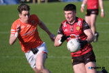 Down's Daniel Guinness in confident form as Armagh's Andrew Murnin moves in at the Ulster Football Semi Final in Clones. Photograph: Columba O'Hare/ Newry.ie - Armagh v Down in Ulster Championship Semi Final 2024