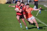 Down's Liam Kerr under attention from Armagh's Aidan Nugent at the Ulster Football Semi Final in Clones. Photograph: Columba O'Hare/ Newry.ie - Armagh v Down in Ulster Championship Semi Final 2024