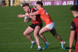 Down's Captain Pierce Laverty is tackled by Armagh's Darragh McMullan at the Ulster Football Semi Final in Clones. Photograph: Columba O'Hare/ Newry.ie  - Armagh v Down in Ulster Championship Semi Final 2024