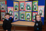 P1 Pupils at St Malachy's PS Ben Rowland and Sarah Rice with some of their class's art based on work by artist Frida Kahlo. Photograph: Columba O'Hare/ Newry.ie  - St Malachy's PS Art Exhibition for Anti Bullying Week