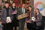 Justin McNulty MLA with Newry High School pupils at the Newry Business Charity Christmas Dinner. Included from left are Adam Glusek, Dominik Blaszczyk, Rachel Harshaw and Lena Durkalec. Photograph: Columba O'Hare/ Newry.ie   - Newry Business Charity Christmas Dinner 2025