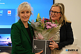 Cllr Geraldine Kearns, Deputy Chairperson, Newry, Mourne and Down District 
Council presents a bouquet to Estonian Ambassador to Ireland, Kairi Kunka at the 
Reel to Revolution film launch at Gael&aacute;ras Mhic Ardghail in Newry. Photograph: 
Columba O'Hare/ Newry.ie - Reel to Revolution film launch at Gael&aacute;ras Mhic Ardghail of Ireland and Estonia Trad Music Exchange in 1988