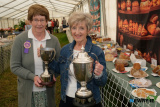 Myrna Glass, left, Chair of the Home Industries Section at Newry Show presents cups to Margaret Crozier, Annalong, for her baking entries. - Newry Show 2025