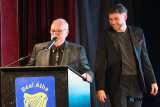 Compere Michael O'Hare welcomes John Reavey to the stage.  - Reavey Brothers 50th Anniversary Tribute