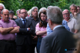 Newry and Armagh MP, Daire Hughes; former MP Mickey Brady and former Councillor Charlie Casey listen to Miami Showband member Stephen Travers. - Miami Showband massacre 50th Anniversary Commemoration