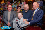 Michael McKeown, President, Newry Chamber of Commerce pictured with Daniel Boyle, one of the Chamber's 'Dream Children' at last weeks Chamber Dinner. Also included is Daniel's Grandad Michael, Aunt Elaine and Dad Michael. Photograph: Columba O'Hare - Newry Chamber of Commerce Annual Dinner