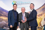 Chairperson Cllr Philip Campbell and Conor Philips are photographed with Gervase McCartan winner of the Fundraising Award for over 40 years of fundraising to Cancer Research. - Chairperson&rsquo;s Civic Awards 2026 
