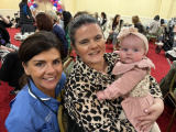 Six-month-old Lena and mum Emma are pictured with their named midwife Helena. 
 - Team Saphire First Anniversary