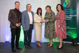 Chairperson Councillor Valerie Harte presents representatives from Cabra Community Association with a Civic Award in the Community Awards Category. Celebrating its 40th Anniversary is a testament to four decades of unwavering dedication to the community. Cabra Community Association were nominated for this award by Cllr Leanne McEvoy. - Newry, Mourne and Down District Council Civic Awards Ceremony 2023