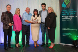 Chairperson Councillor Valerie Harte presents Sarah Jane Campbell with a Civic Award in the Community Awards Category. Along with her team at &lsquo;The Well&rsquo;,  Sarah Jane proactively works to help vulnerable individuals in times of crisis in the battle against suicide. Sarah Jane was nominated for this award by Cllr Michael Rice. - Newry, Mourne and Down District Council Civic Awards Ceremony 2023