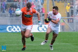 Armagh's Ethan Rafferty and Tyrone's Darren McCurry brave the weather at Croke Park. Photograph: Columba O'Hare - Armagh V Tyrone Croke Park 2017