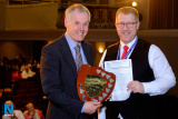 Jonathan Rea, Adjudicator, Newry Musical Feis presentsthe Flute Band Shield to Jimmy Murray, Conductor, Hunter Moore Memorial Flute Band. Photograph: Columba O'Hare/ Newry.ie - Newry Musical Feis 2019