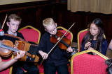 Elaine O'Sullivan with Traditional Arts Partnership musicians and Markethill Primary School entertained at the Confederation of Community Groups, Patricia Graham Shining Light Community Volunteering Awards. Photograph: Columba O'Hare - Shining Light Awards 2017
