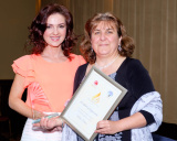 Seanin Graham, family representative presents the Shining Light Award in the Age 25-49 Category to  Vessie Ivanov, Accolade Community Choir. The award was presented at the Confederation of Community Groups, Patricia Graham Shining Light Community Volunteering Awards in  Newry. Photograph: Columba O'Hare - Shining Light Awards 2017