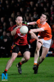 Down's Ryan Mallon and Armagh's Ben Crealey clash at the Dr McKenna Cup game between Armagh and Down at the Athletic Grounds. Photograph: Columba O'Hare - Armagh v Down Dr McKenna Cup 2017