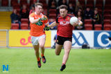 Down's Conor Clarke is tackled by Armagh's Jamie Haughey. Down Minors v Armagh Minors at Pairc Esler. Photograph: Columba O'Hare - Down v Armagh Championship Pairc Esler 2017
