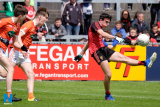Down's Conor McCrickard gets his shot in. Down Minors v Armagh Minors at Pairc Esler. Photograph: Columba O'Hare - Down v Armagh Championship Pairc Esler 2017
