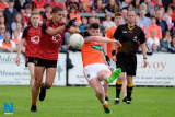 Down's Finn McElroy blocks Armagh's Tiernan Kelly's shot. Down Minors v Armagh Minors at Pairc Esler. Photograph: Columba O'Hare - Down v Armagh Championship Pairc Esler 2017