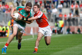 Armagh's Kealan Downey closes in on  Mayo's Fergal Durkan at Croke Park. - All Ireland Minor Football Final 2009 Armagh v Mayo