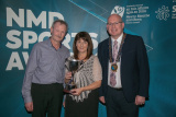 Newry, Mourne and Down District Council Chairperson, Councillor Michael Savage presents the Life Time Services to Sport Award to Andrew Davis and Sylvia McEllhelrron, who accepted the award on behalf of their late father Mr Jimmy Davis. - NMD Sports Awards 2022