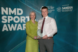  Volunteer Now Manager of Community Engagement, Jane Gribbin presents winner of the Young Sports Volunteer of the Year Award to Liam Toner, Downpatrick Football Club. - NMD Sports Awards 2022