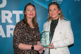 Sport Northern Ireland, Claire Dowdall presents winner of the Senior Sports Volunteer of the Year Award to Orla Morgan, Clonduff Camogie Club. - NMD Sports Awards 2022