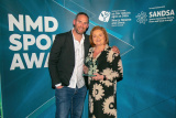 Ulster Rugby Skills Coach, Craig Newby presents winner of the Senior Club Coach of the Year Award to Guinevera McGilligan, Clonduff Camogie Club. - NMD Sports Awards 2022