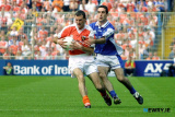 Steven McDonnell, Armagh, fights of the attention from his Laois opponent at Sundays game. Photo: Columba O'Hare - Armagh v Laois 2003
