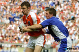 Armagh's Ronan Clarke fends of Laois Paul McDonald during Sundays game at Croke Park. Photo: Columba O'Hare - Armagh v Laois 2003