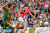 Armagh's Malachy Mackin in a race for the ball at the Ulster Final. - Armagh v Donegal Ulster Final 2006