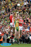 Armagh's Kieran McGeeney and Paul Duffy join forces to keep the ball in Armagh hands at the Ulster Final. - Armagh v Donegal Ulster Final 2006