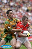 Donegal's Paddy Campbell keeps a firm hold on Armagh's Ronan Clarke at the Ulster Final. - Armagh v Donegal Ulster Final 2006