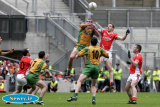Paul McGrane heads for the sky at Croke Park on Sunday. - Armagh v Donegal Ulster Final 2006